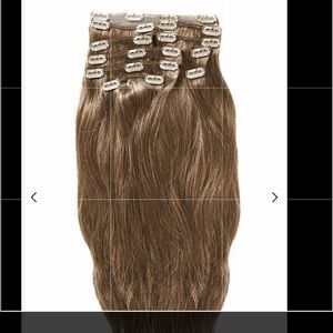 Never worn 20 inch human hair hair extensions.